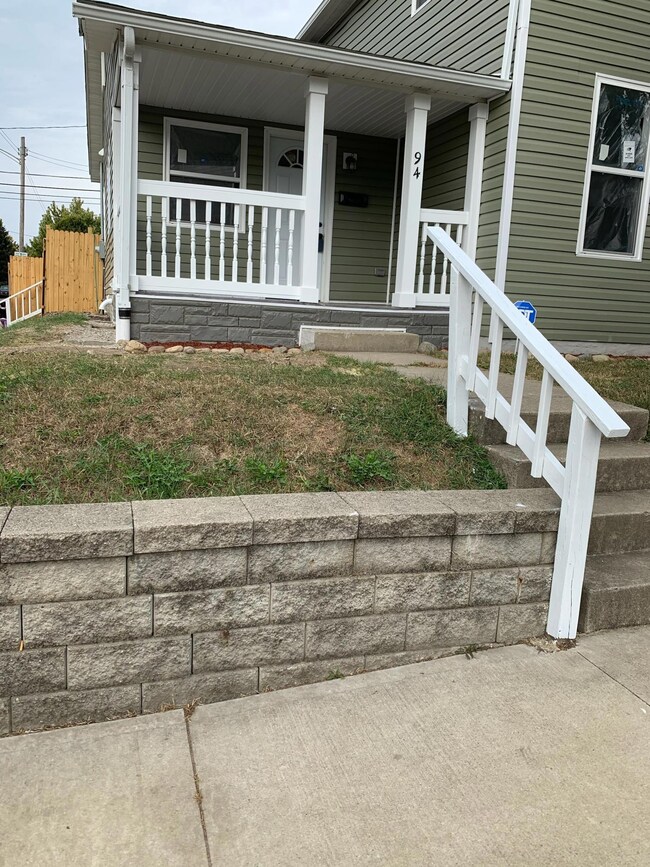 94 front porch and retaining wall