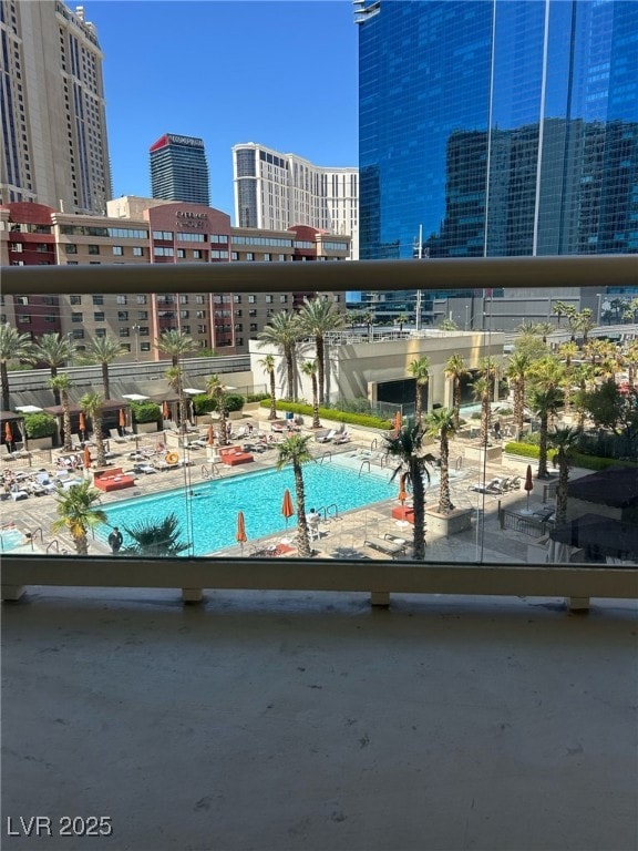 View of pool with a view of city