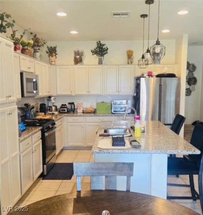 Kitchen with stainless steel appliances, a kitchen