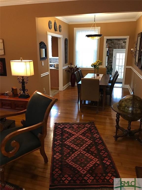 Living room view to dining room and kitchen on the