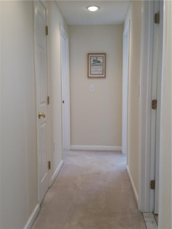 Upstairs hall with linen closet.