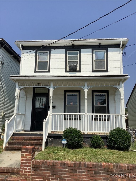 View of front of home with a porch