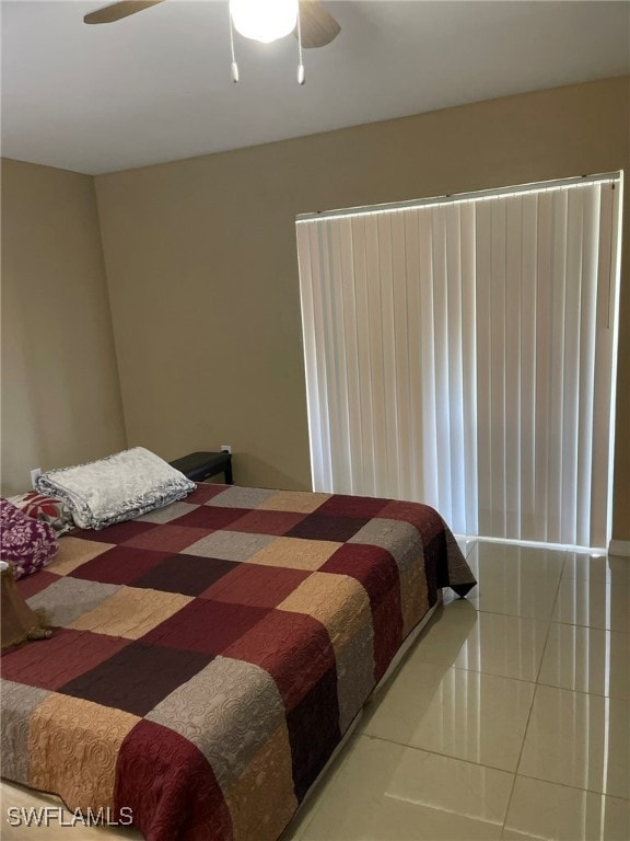 Bedroom featuring tile patterned floors and ceilin