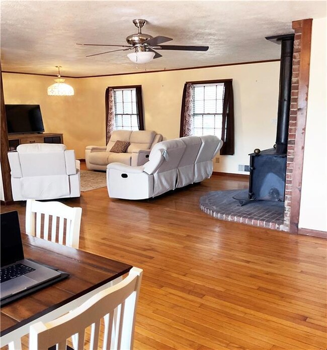 Living room featuring hardwood / wood-style floori