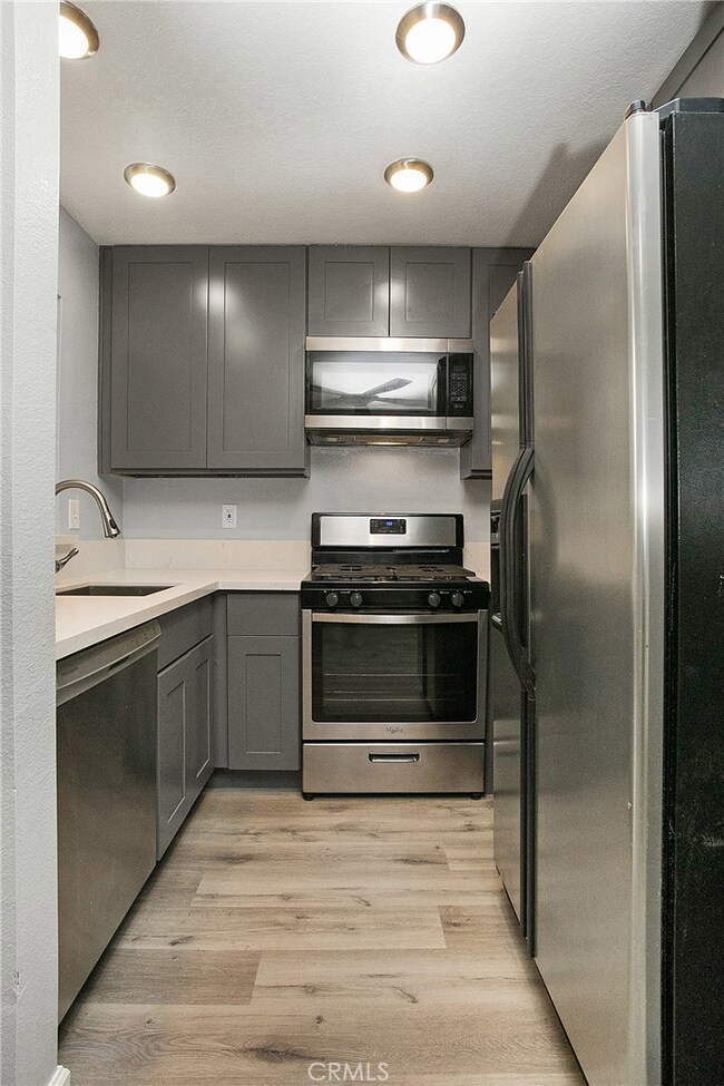 Kitchen is very cozy yet practical.