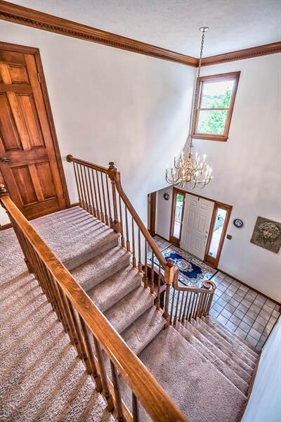 2 Story Entry Foyer with Chandelier, Turned Stairc