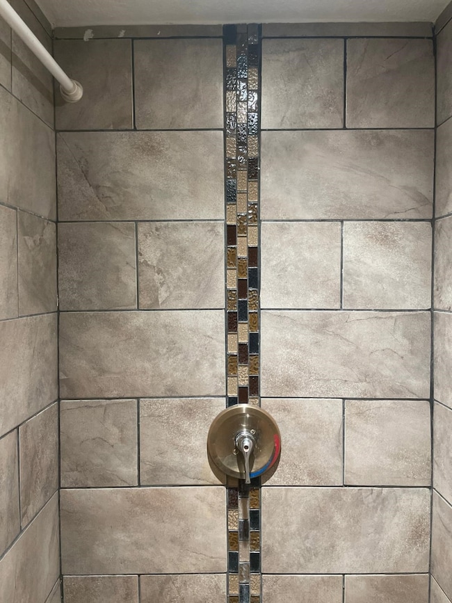 Bathroom view of tiled shower