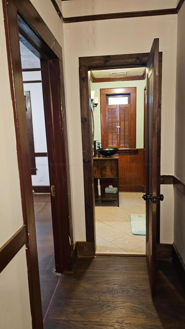 Hall looking into bathroom 1