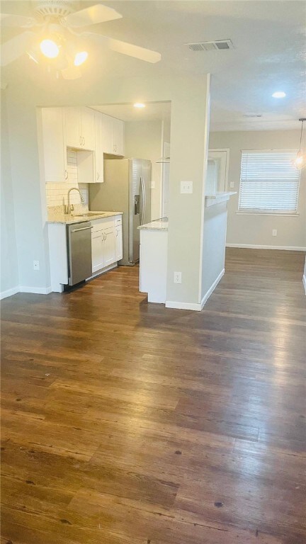 Kitchen featuring appliances with stainless steel