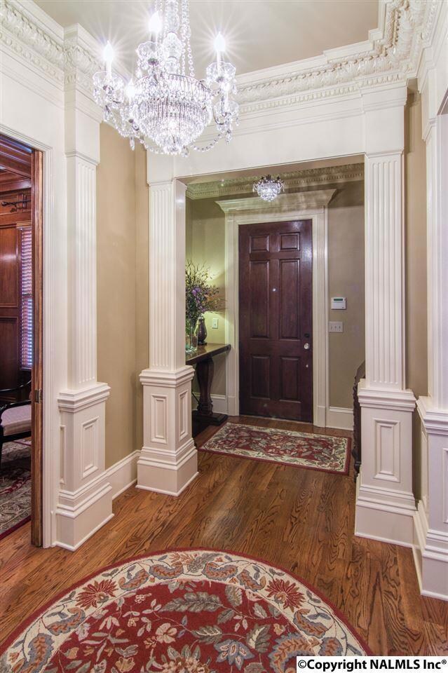 Through the 8' Mahogany front door the exceptional design features introduce you to a one-of-a-kind home for the ages.