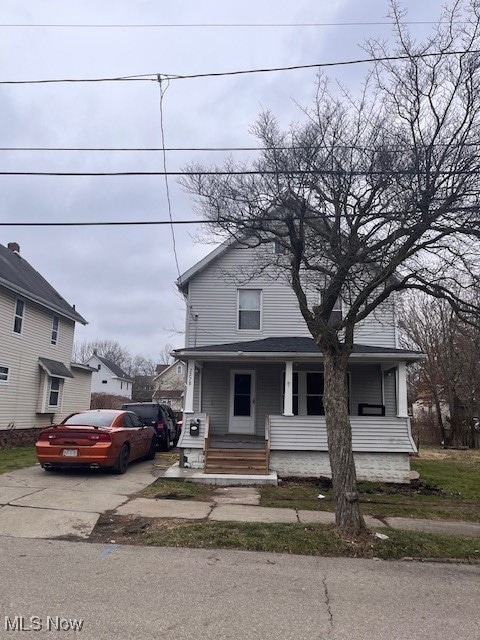 View of front facade featuring covered porch