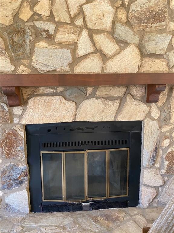 Fireplace in den.