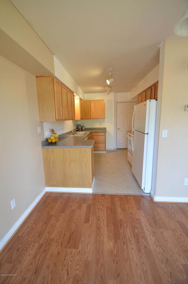 Dining and kitchen with corian counters