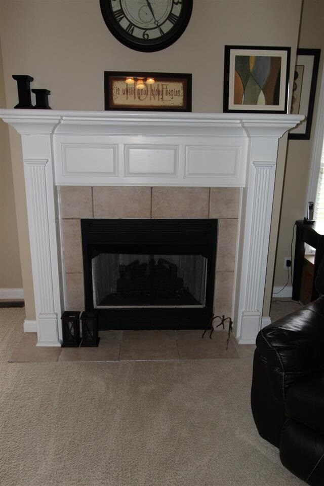 The tile fireplace provides a beautiful centerpiec