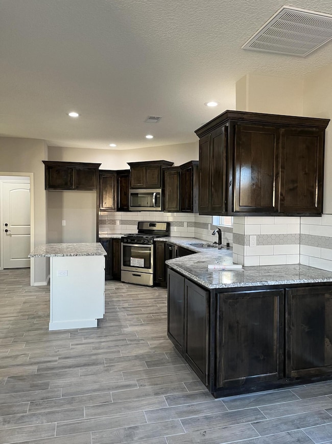 851 Firewheel Loop SW, Los Lunas, NM 87031 - photo 2