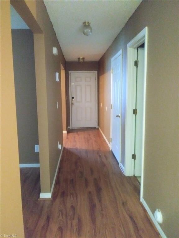 View of front door and entry corridor