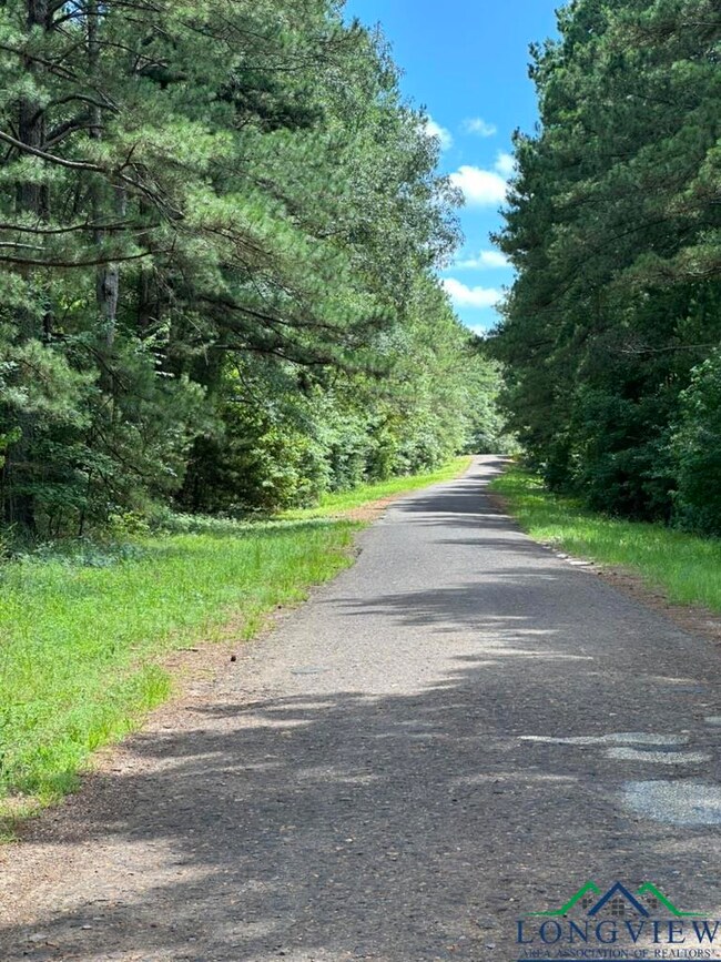 View of street featuring a wooded view