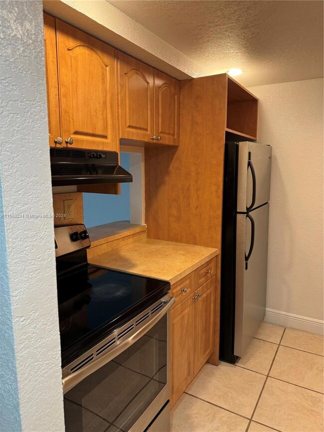 14221 N Kendall Dr unit 406-C, Miami, FL 33186 - photo 3