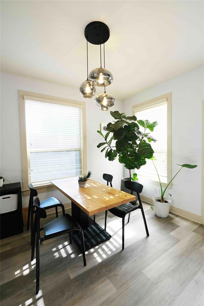 Dining area with wood finished floors