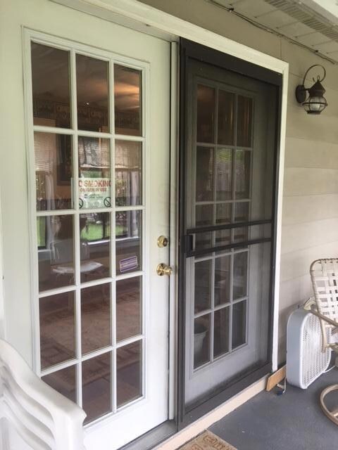 French doors leading to sunroom
