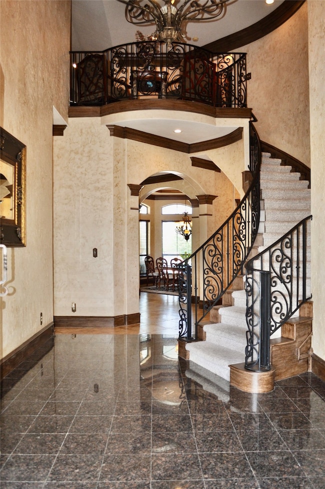 Grand Entry. Marble floors and wrought iron railin