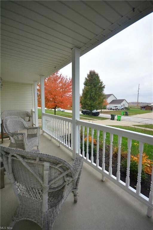 Sit and enjoy your morning coffee on the front por