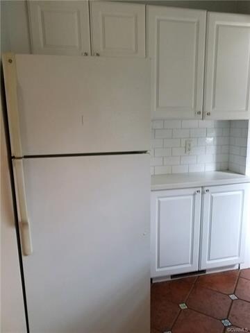 Kitchen - G.E. Refrigerator shall convey as is