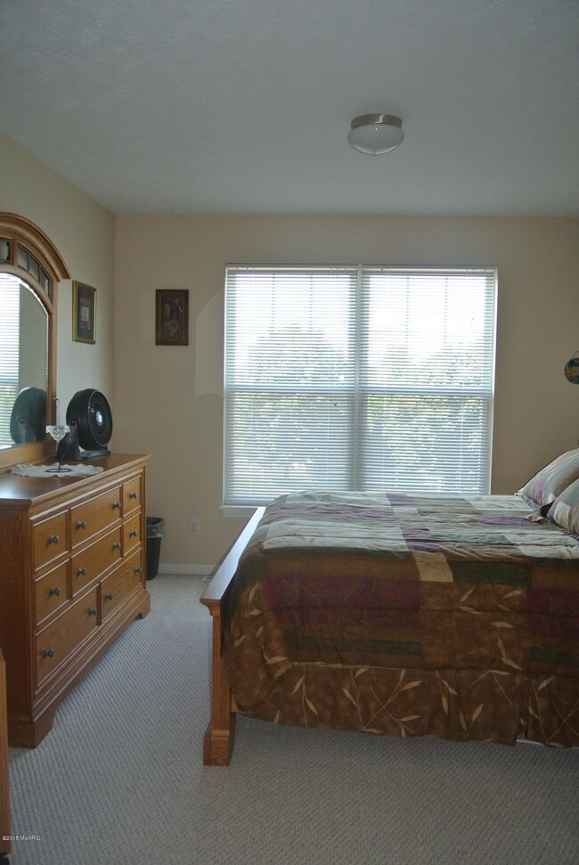 708 Stevenspoint SE unit 32, Byron Center, MI 49315 - photo 4