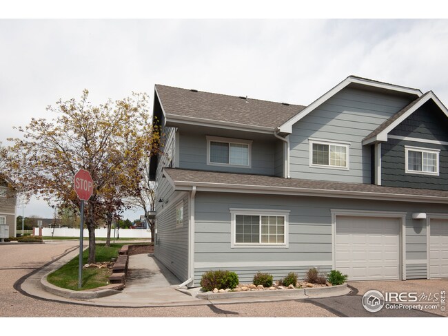 South Facing Rear View with Attached Garage Entry