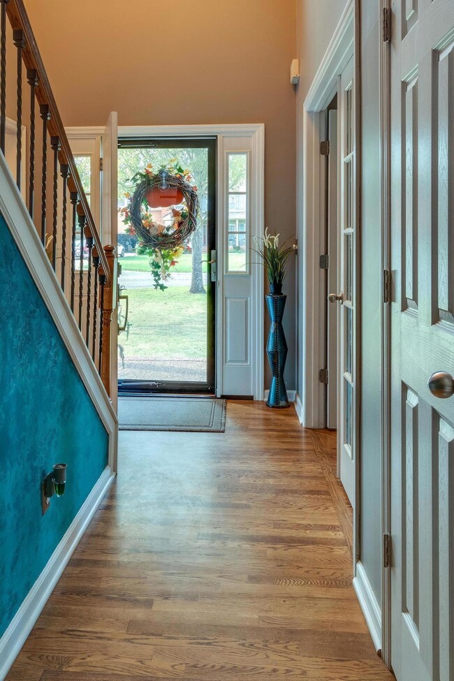 Front door looks over private street.