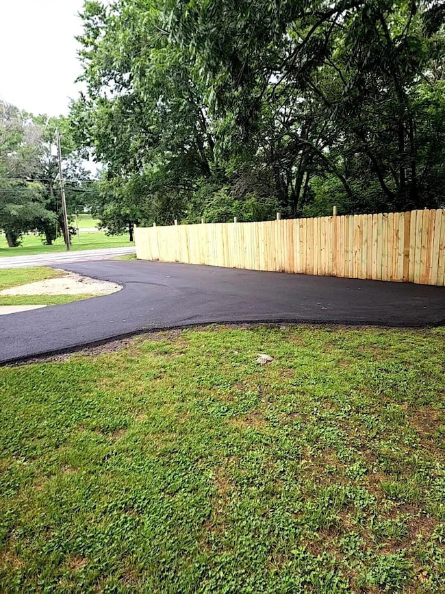 new driveway and fence