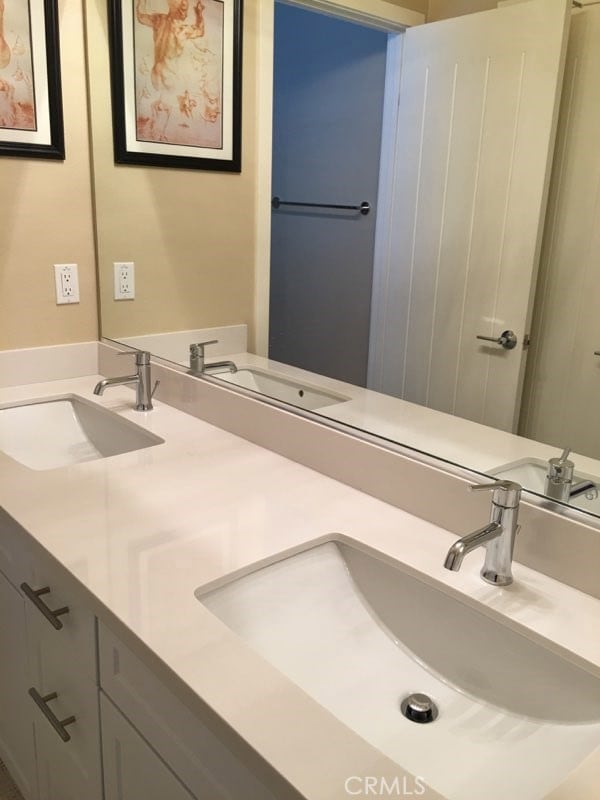 Quartz counter tops , double sink, both bathrooms are the same