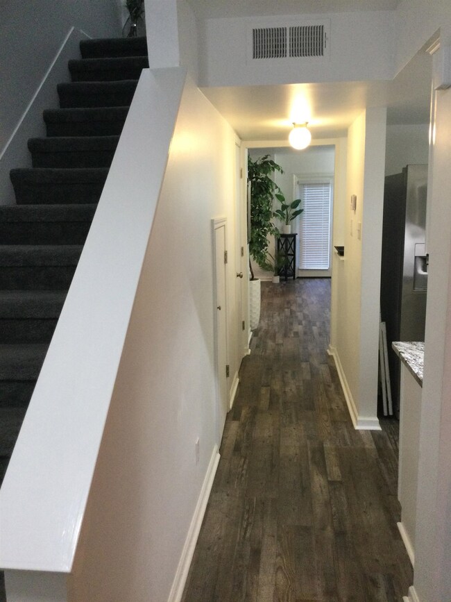 New flooring, kitchen to the right half bath to th