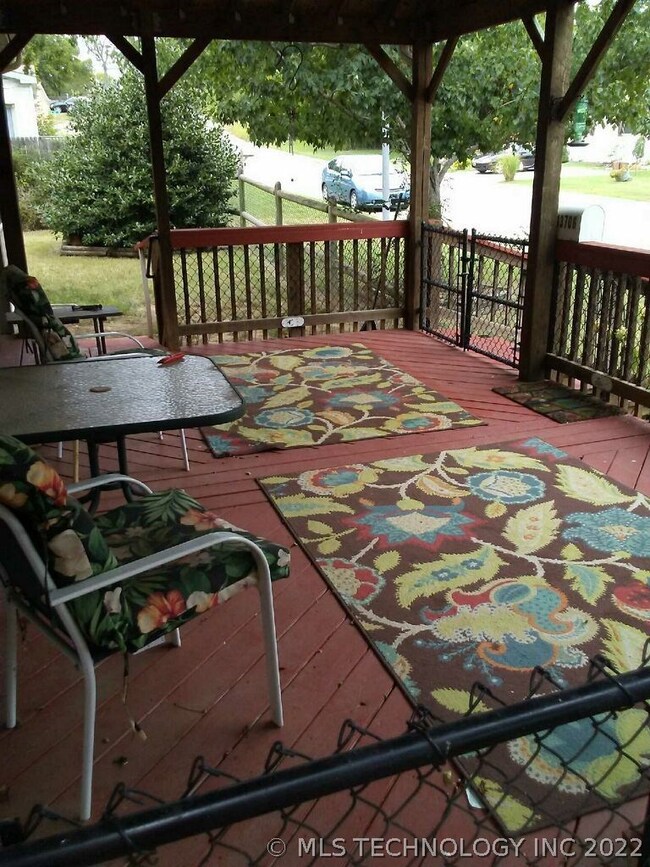 East side covered deck, beyond is fur baby private