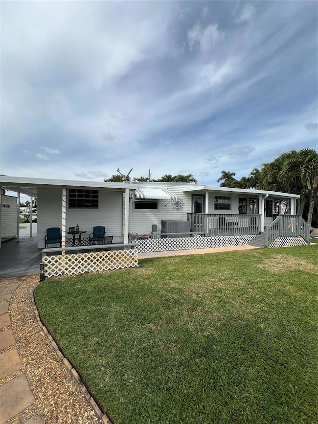 Enjoy the outdoor deck or covered patio.