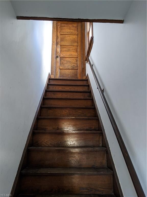 Access in the front is up a single flight of stairs.