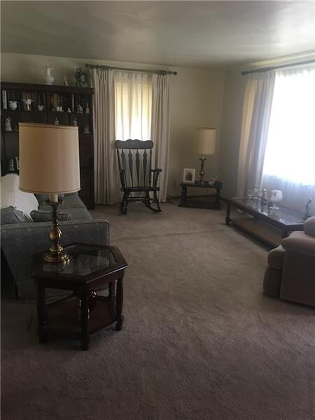 Living room with lots of light coming in.  double 