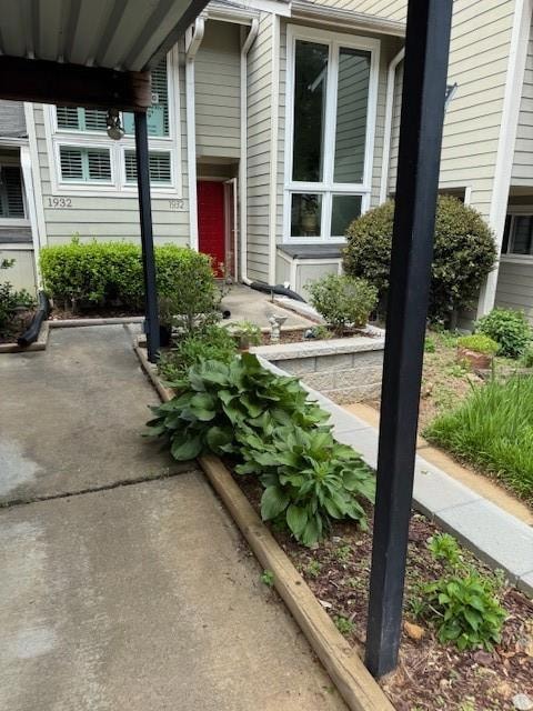 View of exterior entry & parking.