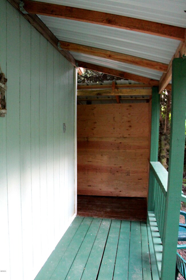 Deck with wood storage area