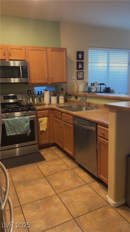 Kitchen with appliances with stainless steel finis
