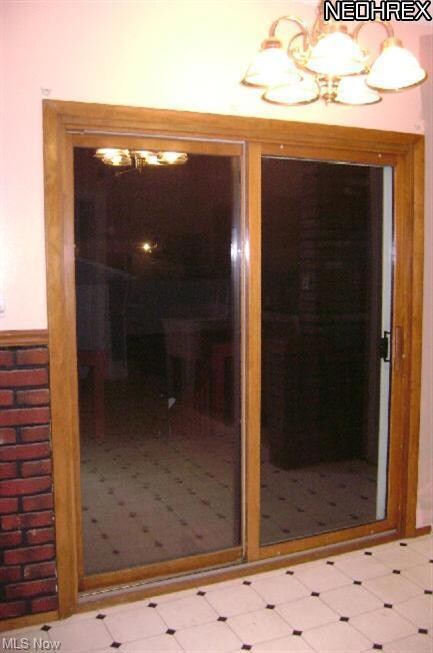 Sliding doors leading to backyard deck.