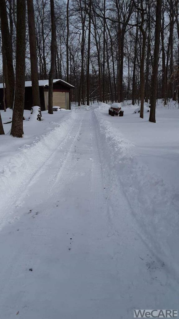 LONG PRIVATE DRIVE TO SECLUDED HOME