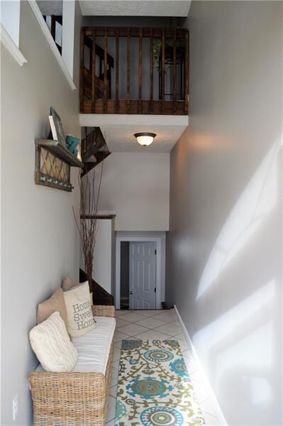 Gorgeous multi-level entry way with access to game