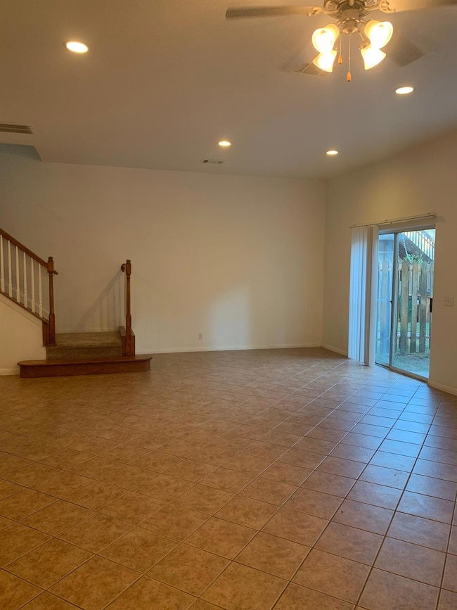 Spare room with recessed lighting, ceiling fan, s