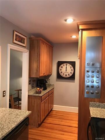 Plenty of extra granite countertops and cabinetry.