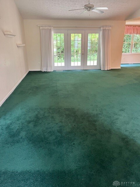 From front door looking through living room to fre