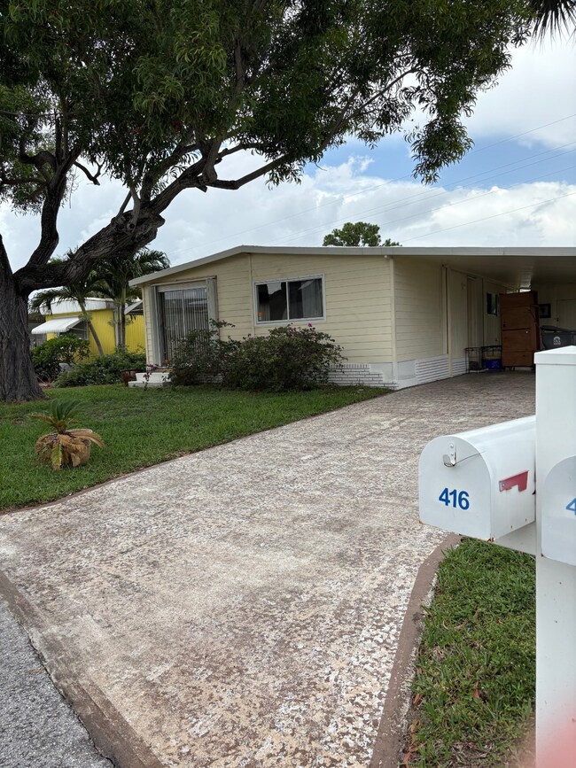 4171 74th Rd N unit 416, Riviera Beach, FL 33404 - photo 2