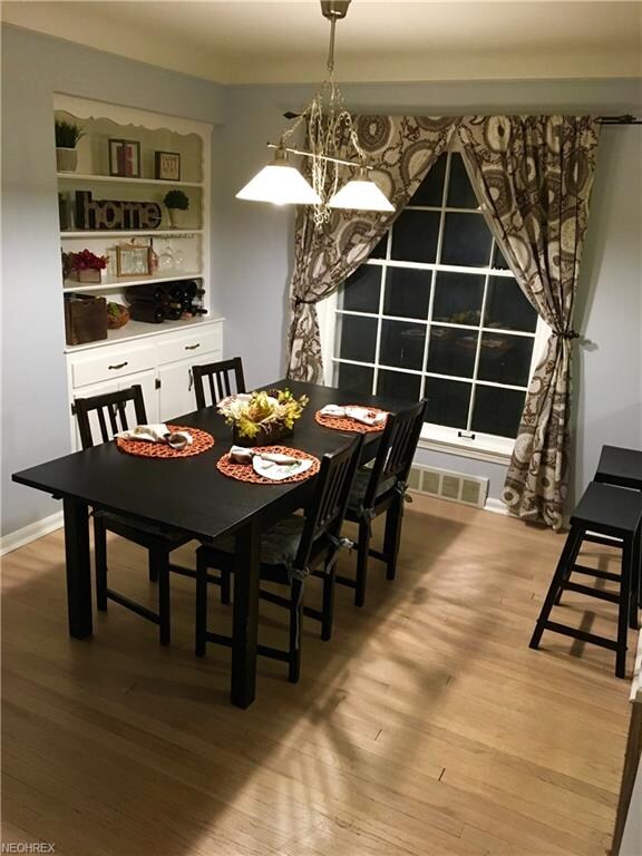 Natural hardwood floors, beautiful built-ins and o