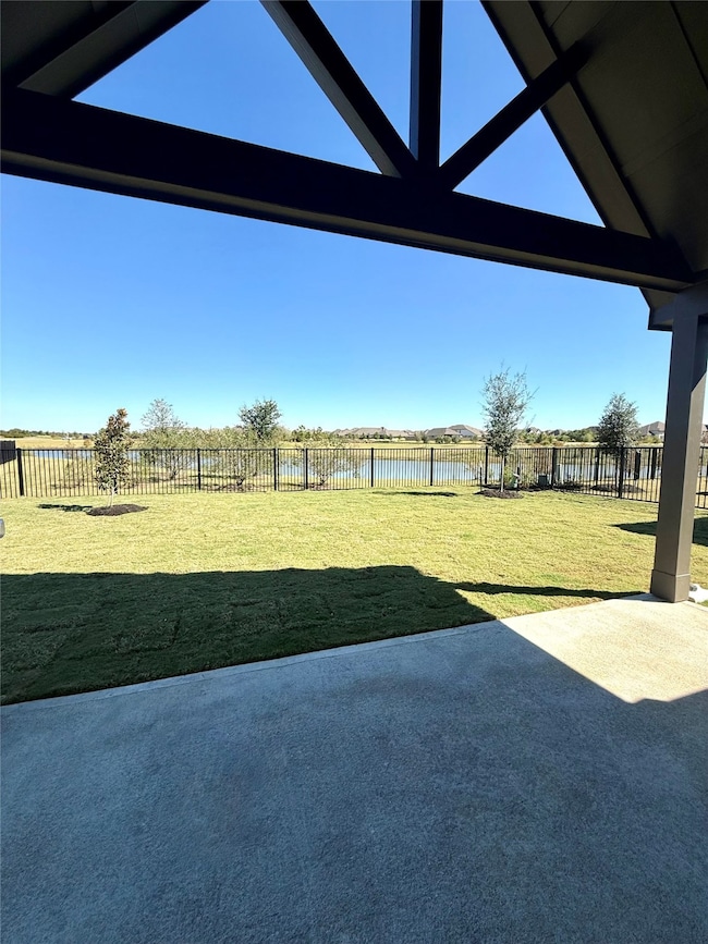 Gorgeous views from the backyard with a relaxing covered patio overlooking the water.