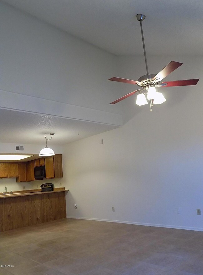 Living Room w/ Vaulted Ceiling